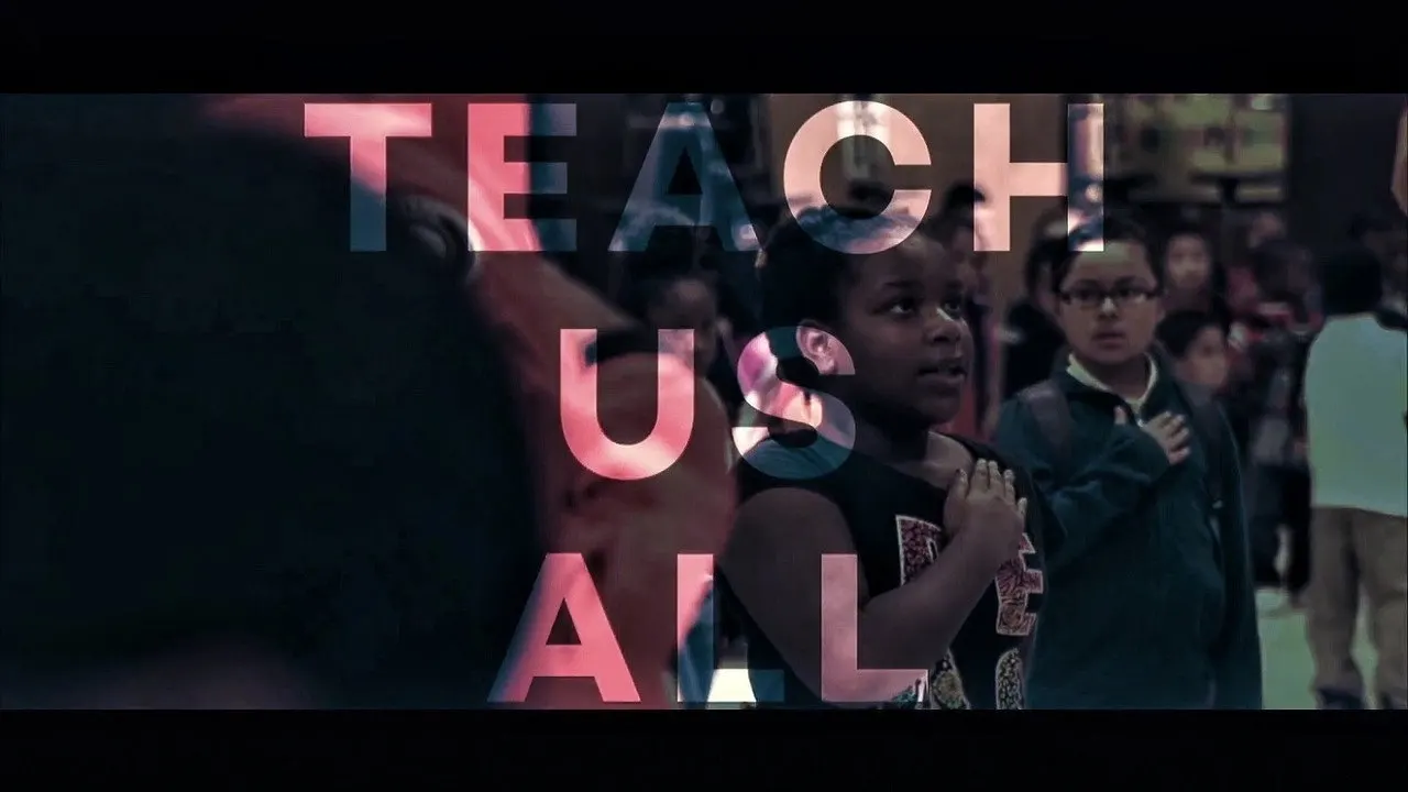 Teach Us All backdrop