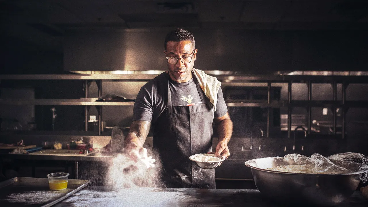 The Migrant Kitchen backdrop